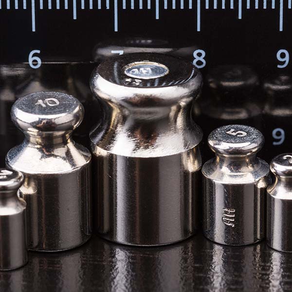 Mass standards on dark background